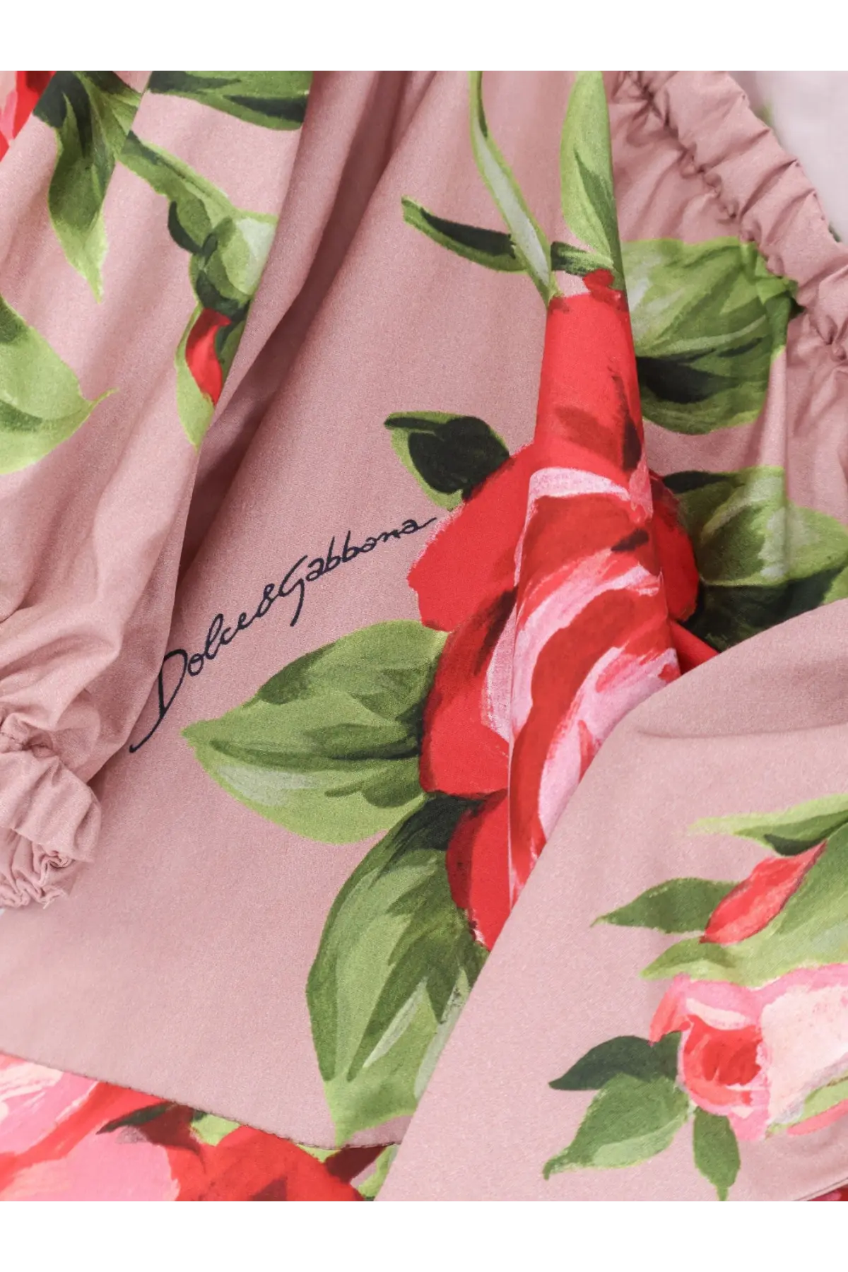 Dolce &amp; Gabbana women’s pink cotton top with vibrant red and green floral print and ruffled detailing