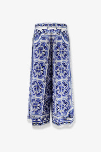 Dolce and gabbana women’s cotton trousers with white and blue ceramic tile patterned wide-leg design