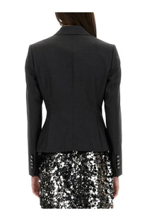 Black tailored blazer with structured shoulders and three-button cuffs for women by Dolce &amp; Gabbana in grey