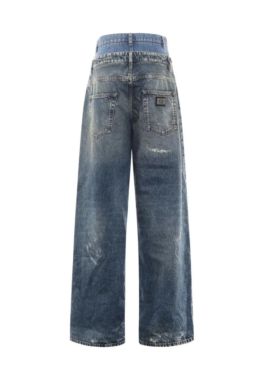 Back view of dolce &amp; gabbana women’s high-waisted wide-leg denim jeans in faded blue with distressed details and brand patch
