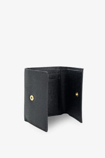 Dolce &amp; Gabbana women’s hammered leather wallet in black with textured surface and gold-tone snap buttons