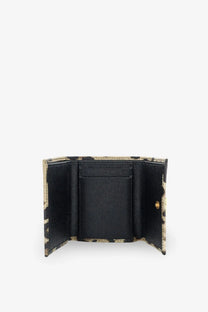 Dolce and gabbana women’s hammered leather wallet featuring black and beige leopard print and textured interior