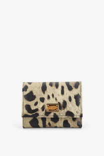 Dolce &amp; Gabbana women’s compact beige and black leopard-print hammered leather wallet with gold-tone plaque
