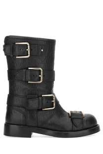 Dolce &amp; Gabbana women’s black leather combat boot with three silver buckle straps and distressed textured finish
