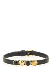 Dolce &amp; Gabbana women’s black leather choker with gold-tone hardware and decorative heart-shaped pendant charms