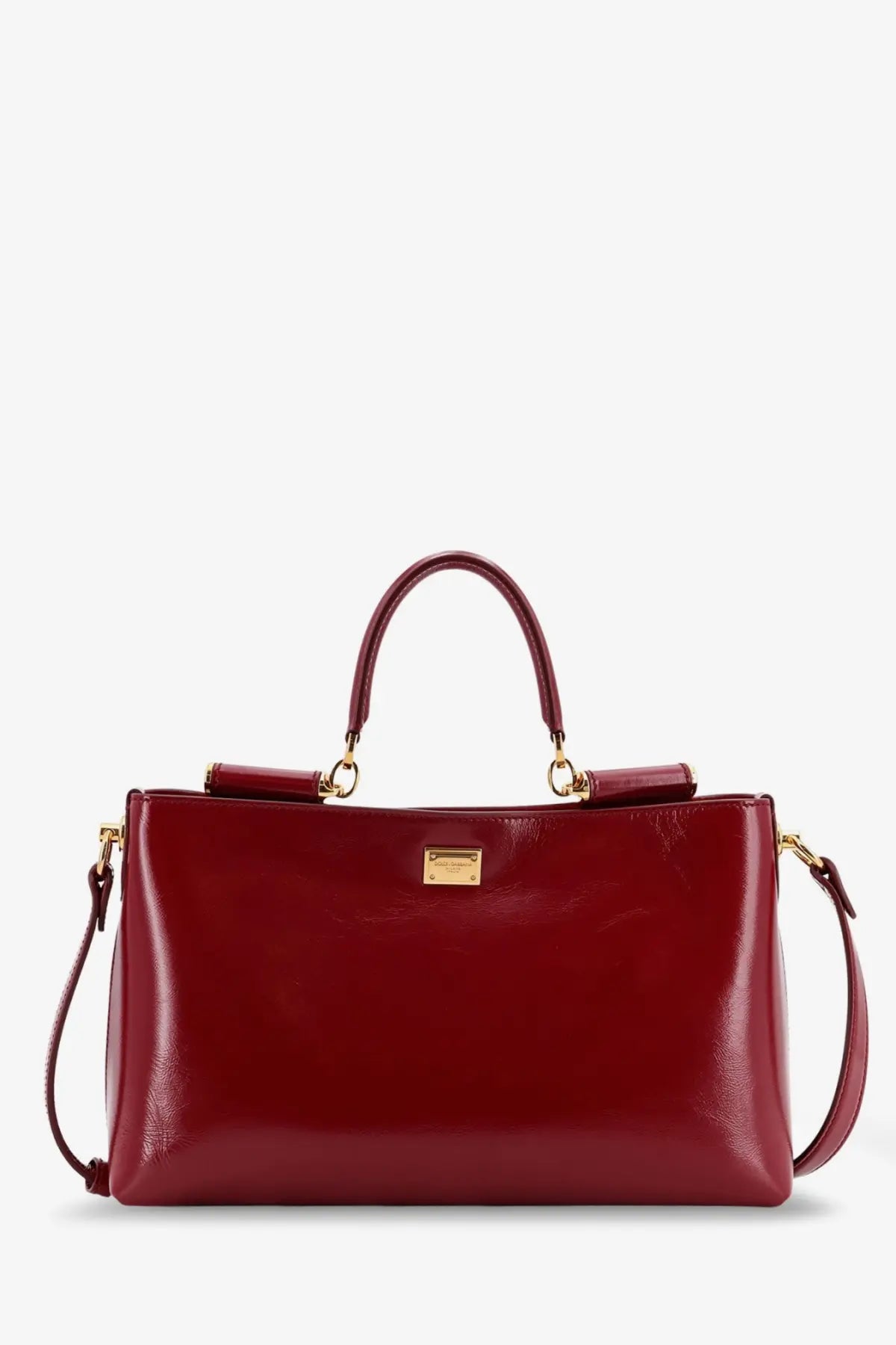 Dolce &amp; Gabbana women’s leather crossbody bag in glossy burgundy with gold-tone hardware and structured rectangular shape