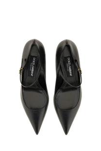 Dolce &amp; Gabbana women’s black leather high-heeled pumps with pointed toe and gold-tone buckle strap