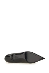 Dolce &amp; Gabbana women’s black patent leather pointed-toe pump with a sleek glossy finish and minimalist design