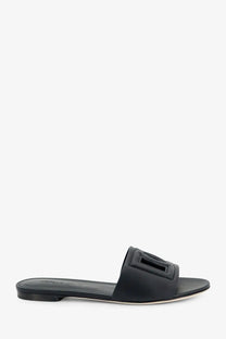 Dolce and Gabbana women’s black leather slide sandal with rectangular buckle detail