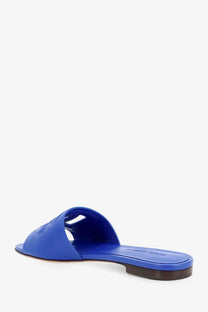 Bright blue leather slide sandal from Dolce &amp; Gabbana with minimalist design and embossed logo on the insole
