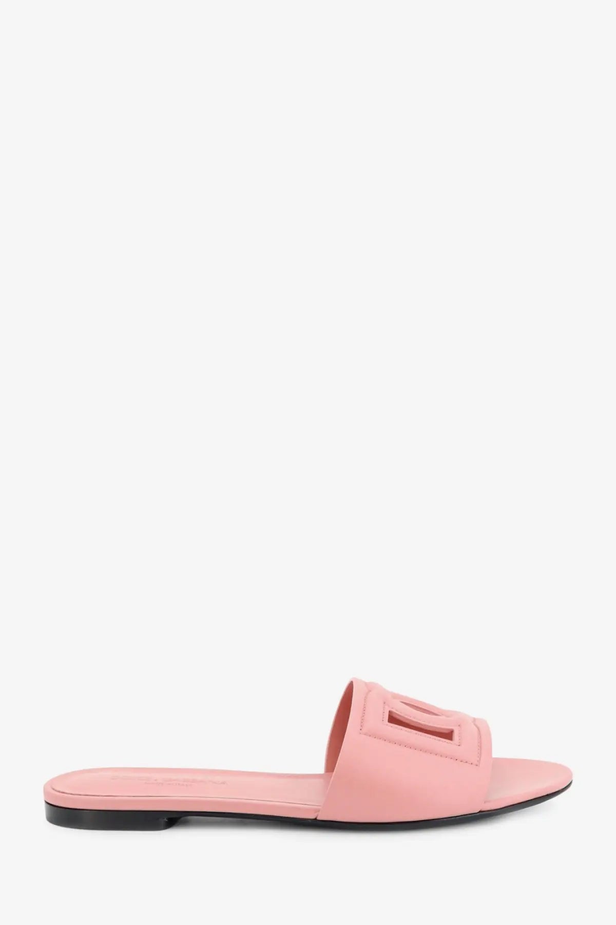 Dolce &amp; Gabbana women’s pink leather slide sandal with rectangular cutout detail on the strap