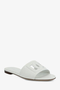 Dolce and gabbana women’s white leather slide sandal with cut-out logo detail