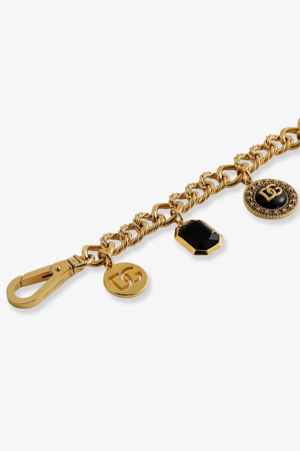 Gold-toned brass chain bracelet with black onyx and engraved dg charms by dolce gabbana women like virgin collection