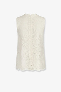 Dolce &amp; Gabbana women’s white stretch lace sleeveless top with scalloped hem and back zipper shown from the back