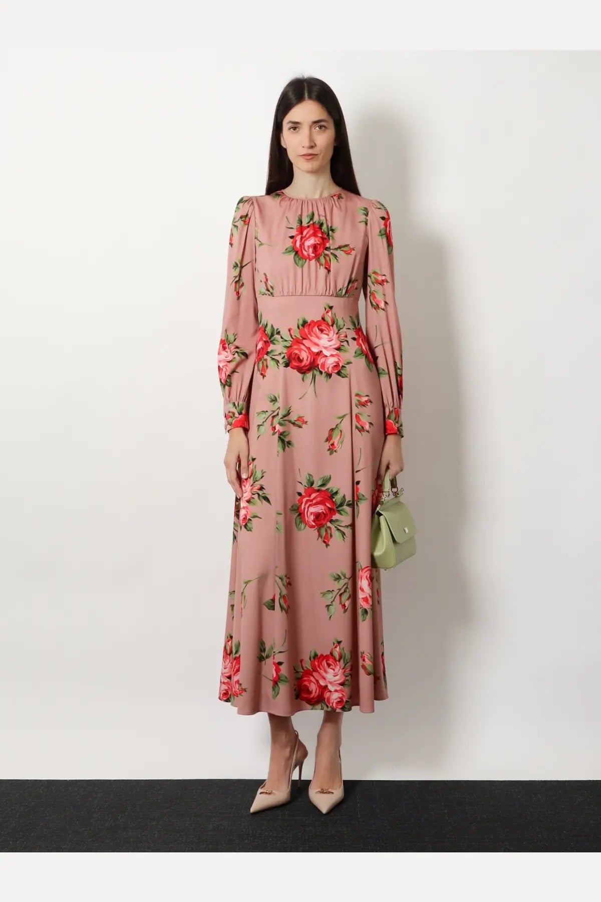 Dolce &amp; Gabbana women’s long silk midi dress in pink with bold red roses and green leaves and a gathered neckline