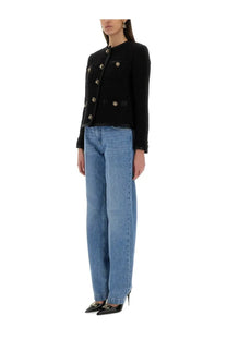 Black tweed jacket with gold-tone floral buttons and classic double-breasted design paired with dolce and gabbana blue loose denim jeans