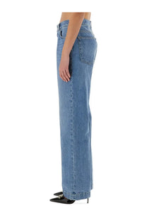 Dolce &amp; gabbana women’s loose light-wash denim wide-leg jeans with classic five-pocket design and rolled cuffs