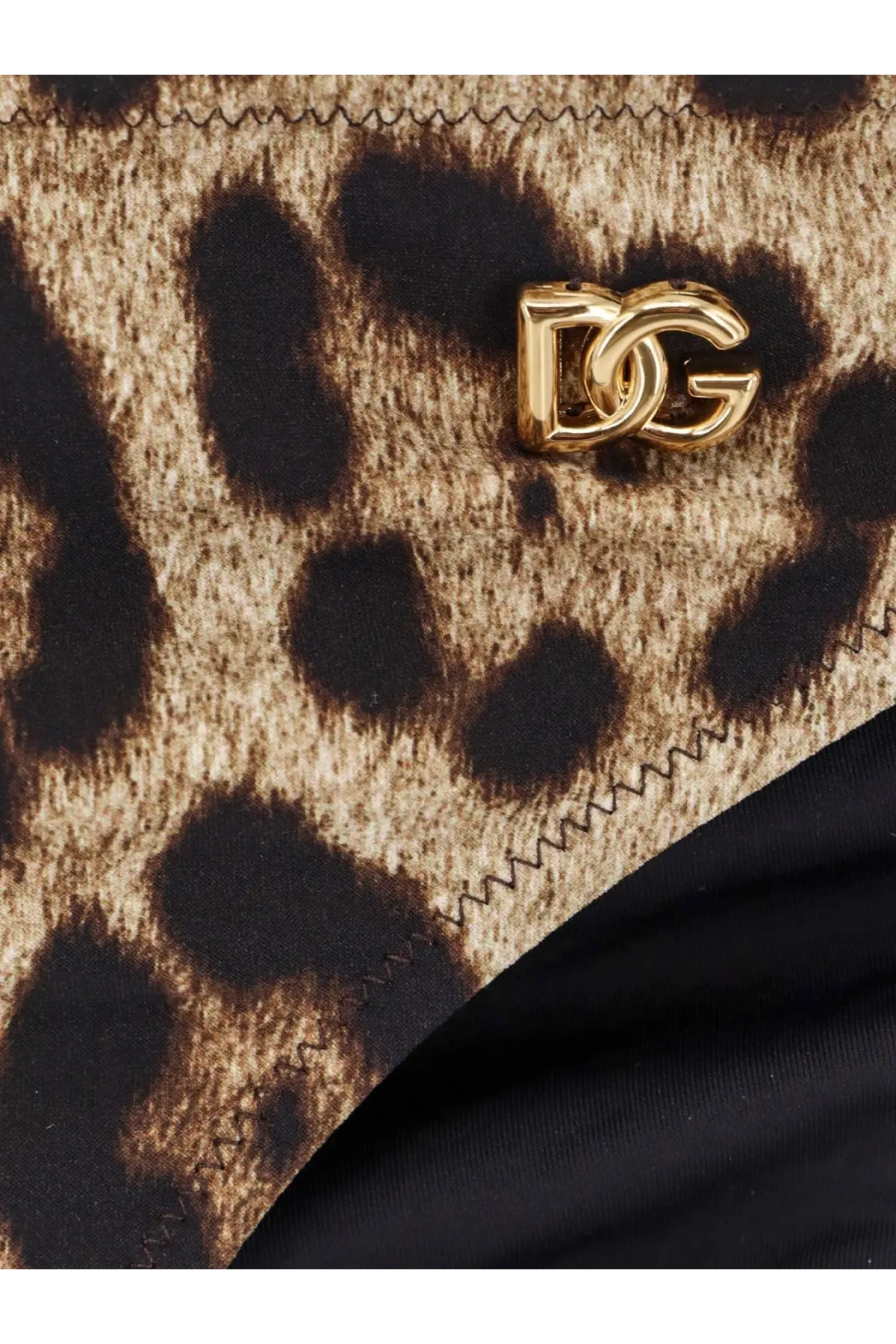 Gold tone dg logo clasp on leopard print lycra fabric of dolce and gabbana womens bikini bottoms back side