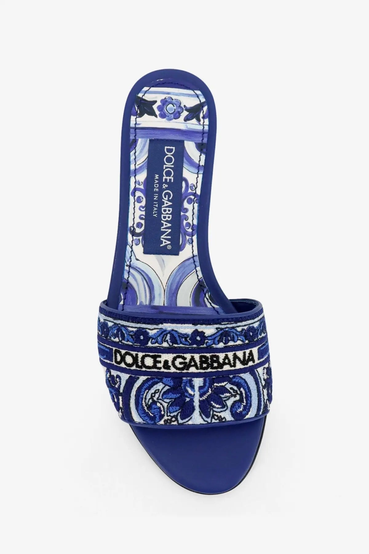 Blue dolce and gabbana women’s maiolica slide sandal with intricate white and navy floral embroidery