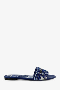 Blue dolce and gabbana women’s maiolica slide sandal with white and navy patterned strap for casual wear