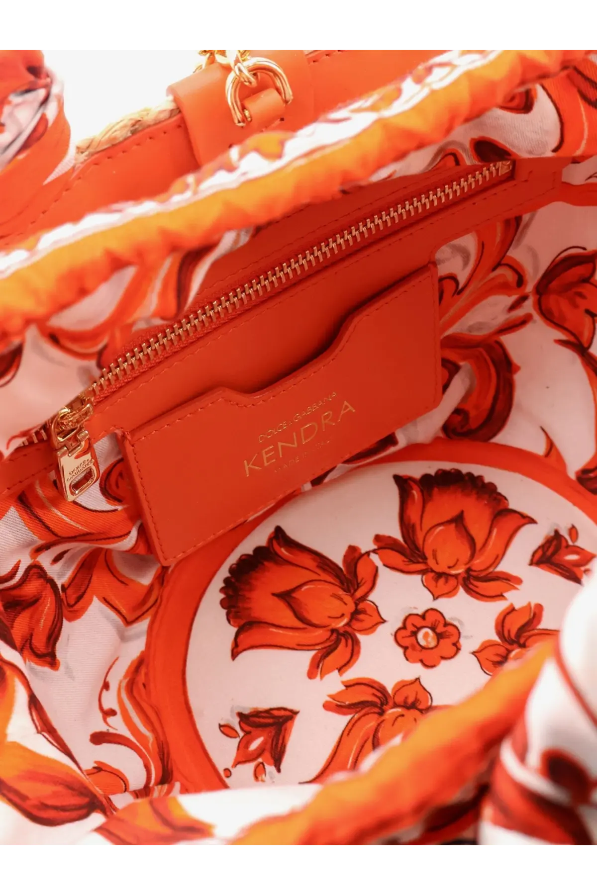 Dolce &amp; Gabbana women’s maiolica shoulder bag in leather and raffia orange with vibrant floral pattern and gold-tone hardware