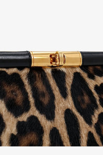 Dolce &amp; Gabbana women’s marlene shoulder bag in black and gold leopard print pony skin with polished metal clasp