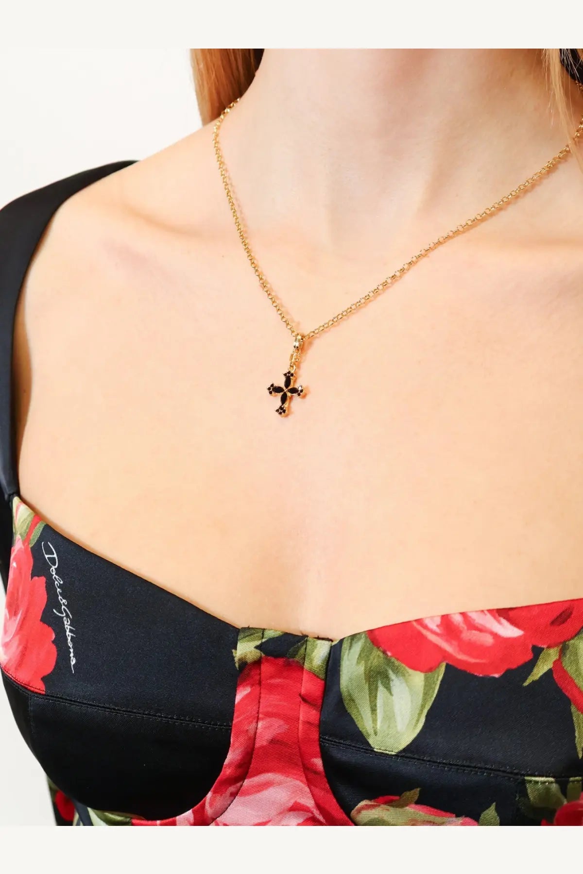 Dolce &amp; Gabbana women’s gold metal chain necklace with a small black cross pendant