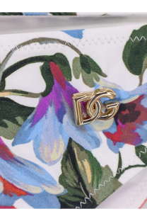 Gold-tone dg logo clasp on white nylon fabric with vibrant floral print on dolce and gabbana womens bikini