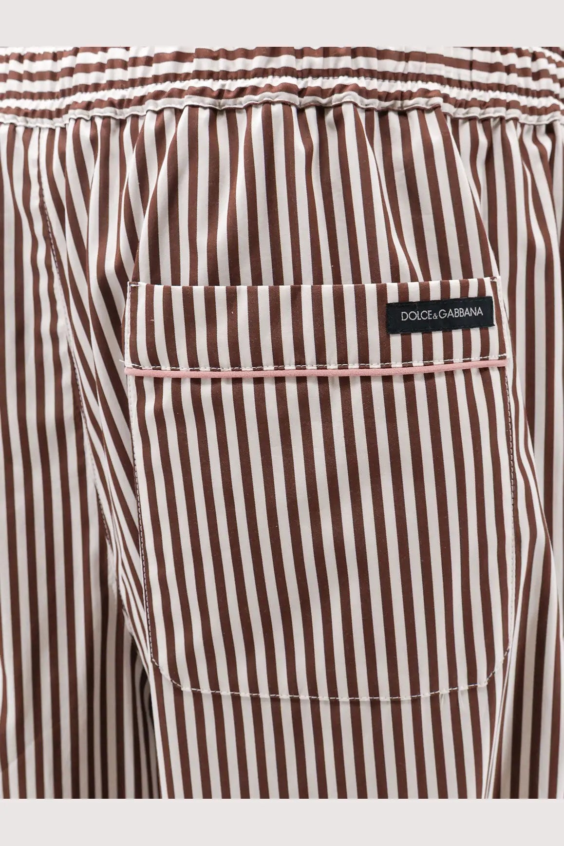 Dolce &amp; gabbana women’s cotton poplin pajamas trousers with brown and white vertical stripes and pink-trimmed pocket