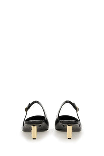 Dolce &amp; Gabbana women’s patent leather slingback heels in black with gold-tone block heels