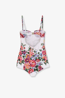 Dolce &amp; Gabbana women’s white one piece swimsuit with vibrant red pink and blue floral pattern on a crisp background