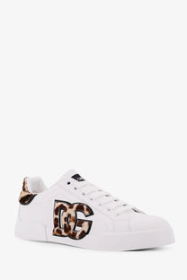 White dolce and gabbana low-top leather sneaker with bold leopard print dg logo and matching heel tab