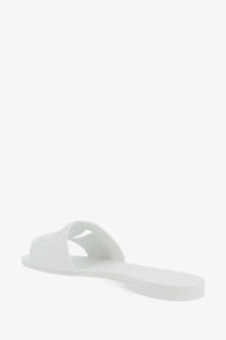 Dolce &amp; gabbana women’s white minimalist slide sandal in sleek pvc with smooth material and open-toe design