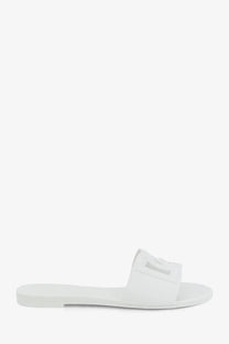 White dolce &amp; gabbana women’s pvc slide sandal with minimalist design and subtle logo detail on strap