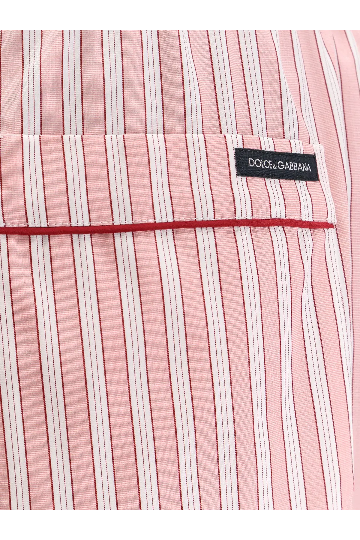 Dolce and gabbana women’s pink and white striped cotton pyjamas shirt with black label on pocket and silk trousers pattern