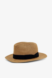 Tan woven straw fedora hat with black ribbon band by Dolce and Gabbana for women in beige raffia material