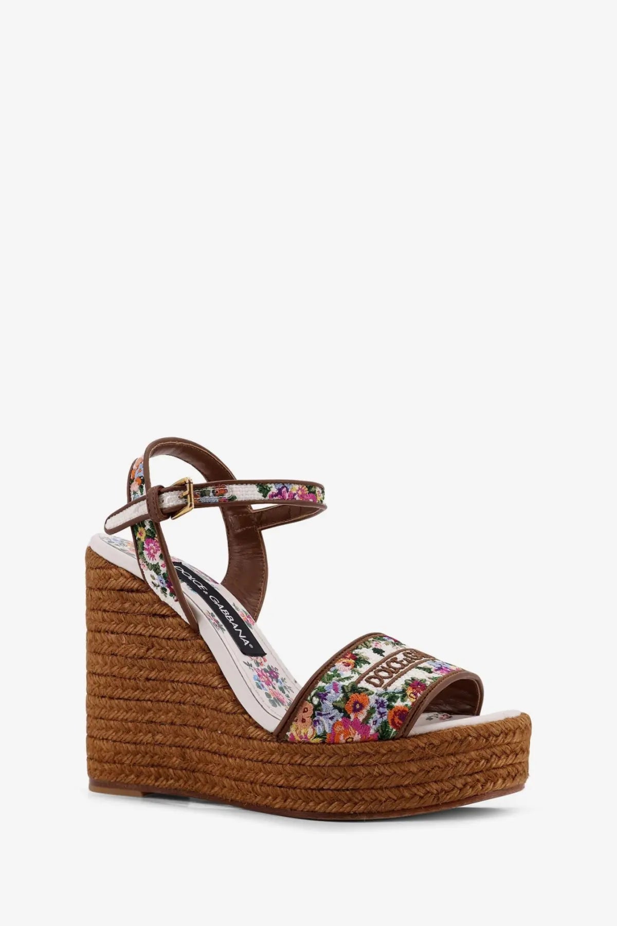 Dolce &amp; Gabbana women’s white raffia espadrille wedge sandals with floral pattern, brown leather straps, and jute sole