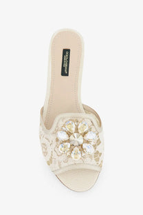 Beige lace slide sandal with clear and pale yellow teardrop crystals from dolce and gabbana rainbow lurex collection