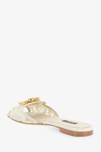 Cream-colored lace mule sandal with gold-tone buckle accent from Dolce &amp; Gabbana women’s rainbow lurex lace sandals ghiaccio