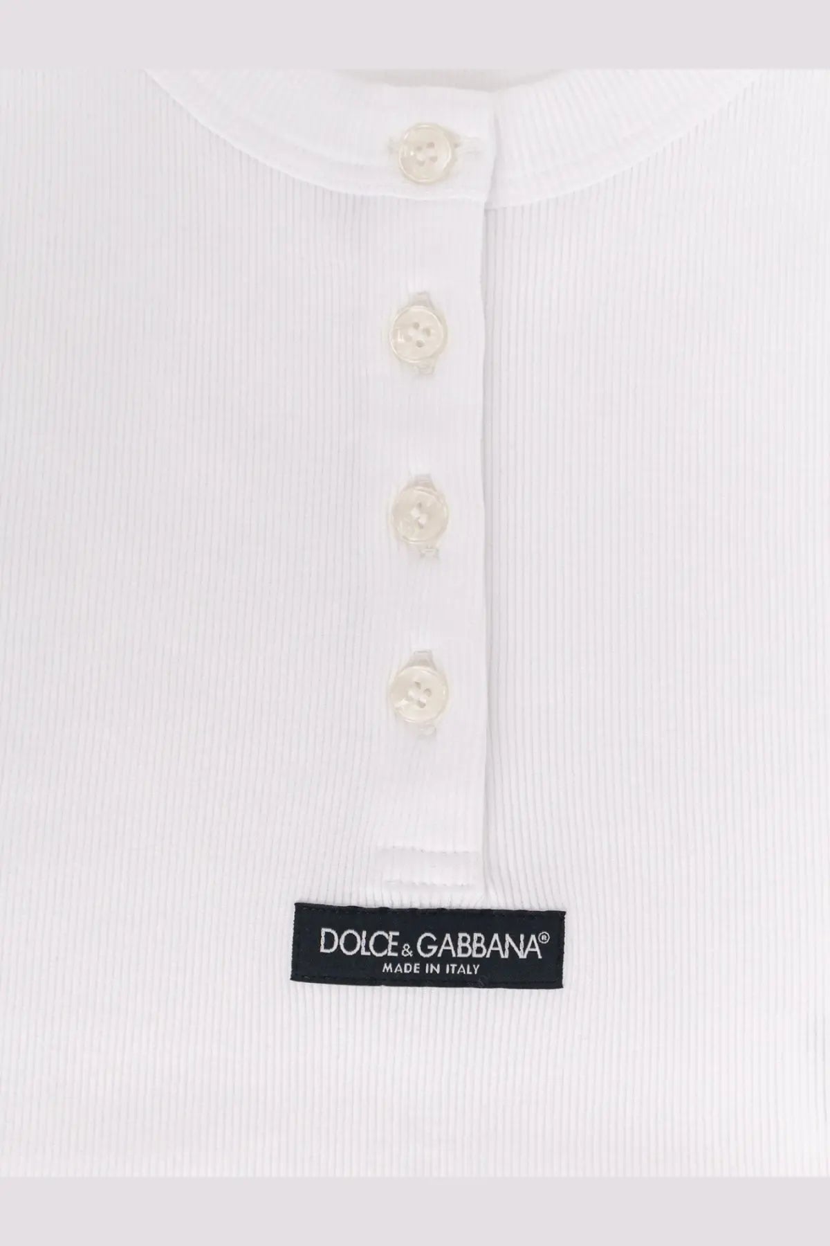 Dolce &amp; Gabbana women’s white ribbed cotton henley top with cream buttons and branded label