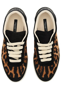 Dolce &amp; Gabbana women’s Saint Tropez sneaker in black and tan leopard-print suede with white laces and black sole