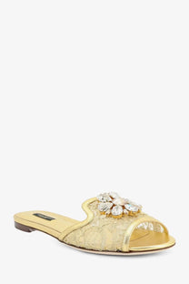 Dolce &amp; Gabbana women’s gold lace slide sandal with sparkling crystal flower embellishment in pizzo lurex material