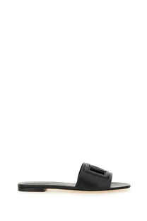 Dolce &amp; Gabbana women’s black leather slide sandal with rectangular buckle detail for casual wear