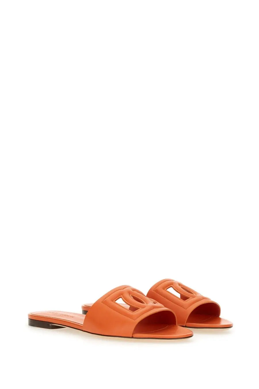 Dolce &amp; Gabbana women’s orange leather slide sandals with a distinctive cut-out logo design