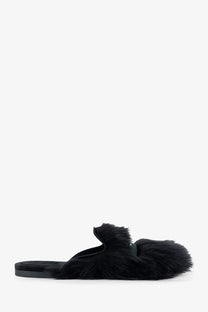 Dolce &amp; Gabbana women’s black sheepskin and suede slip-on mule sandal with plush textured upper and flat sole