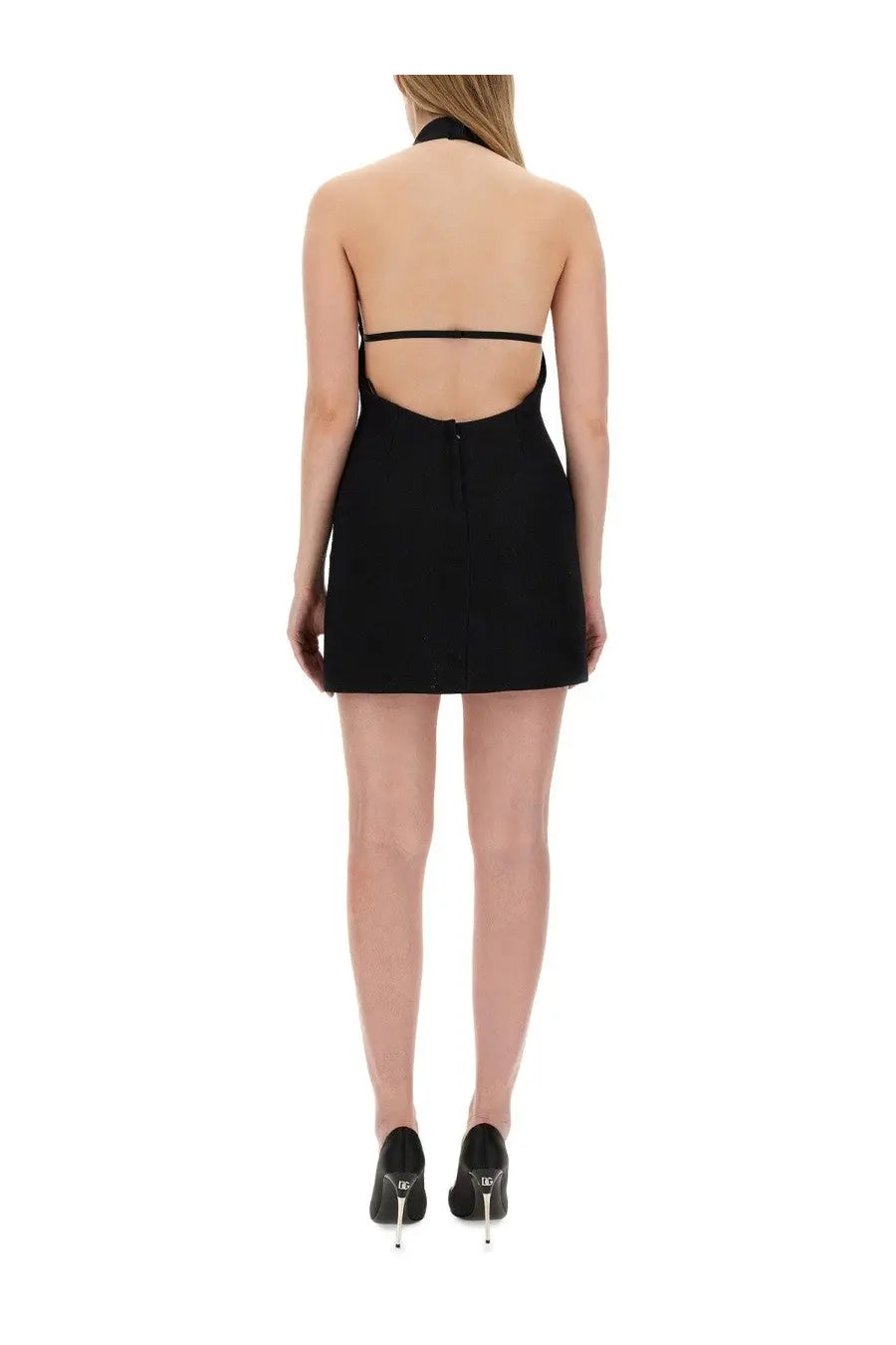 Dolce &amp; Gabbana women’s black halter-neck mini dress with back cutout and thin straps shown from the back