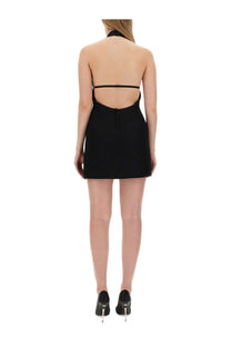Dolce &amp; Gabbana women’s black halter-neck mini dress with back cutout and thin straps shown from the back