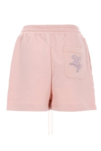 Dolce &amp; Gabbana women’s pink cotton shorts with subtle embroidered logo on front pocket and adjustable drawstring waistband