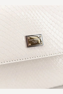 White snake-print leather clutch with gold-tone dolce and gabbana logo plaque from dolce and gabbana