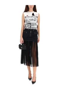 Black mini handbag with gold tone clasp and handle complementing dolce and gabbana women’s silk midi skirt black